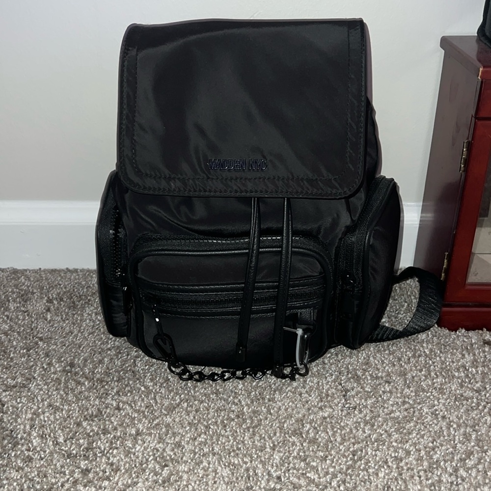 A black Steven madden backpack